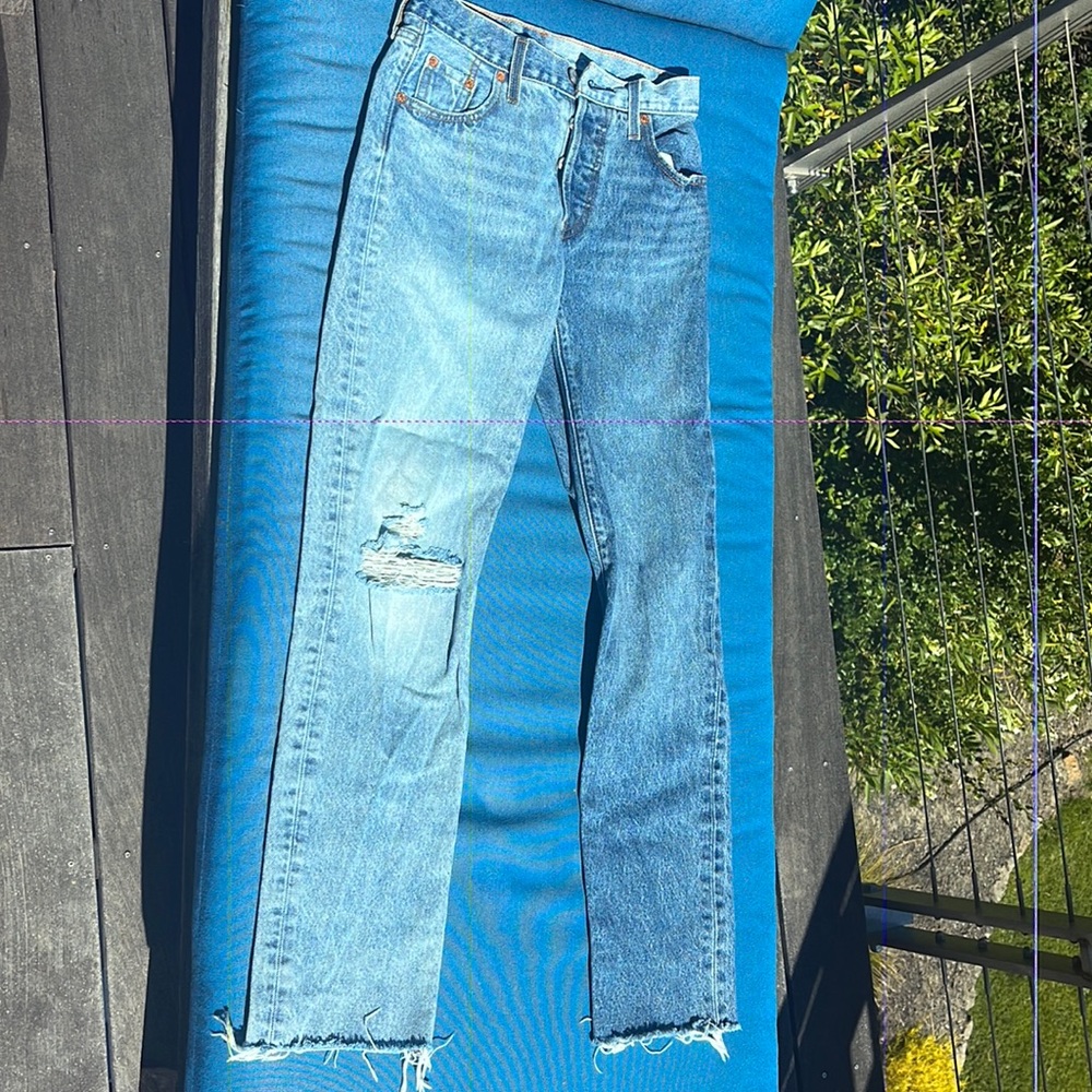 Two toned Levi’s jeans, W23, L30